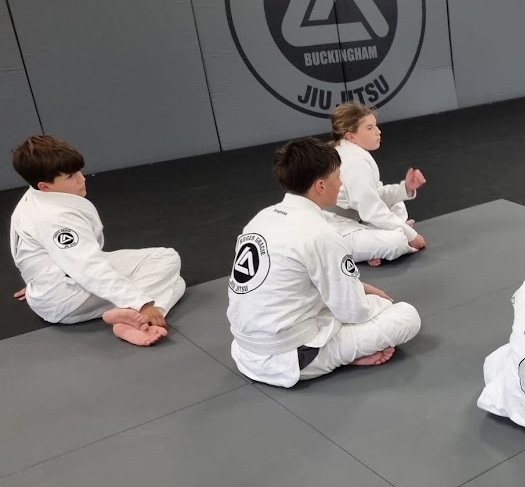 Children aged 9 to 15 training Brazilian Jiu-Jitsu at RGA Buckingham